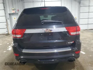 2012 Jeep Grand Cherokee SRT8 with VIN 1C4RJFDJ7CC187475, listed as a Copart auction lot 45191285 with 133,748 mi miles and Salvage Title. Bid and sale history available at carsss.com. Image 6.