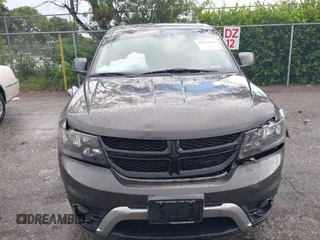 2020 Dodge Journey Crossroad with VIN 3C4PDCGB0LT270042, listed as a IAAI auction lot 40521806 with 102,934 mi miles and . Bid and sale history available at carsss.com. Image 6.