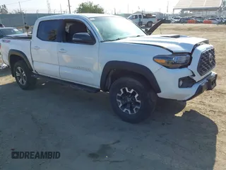 2021 Toyota Tacoma SR z VIN 3TMCZ5AN9MM420434, wystawiony jako IAAI lot #42396932 z przebiegiem 76 614 mil mil oraz . Historia ofert i sprzedaży dostępna na DreamBid. Obrazek 1.