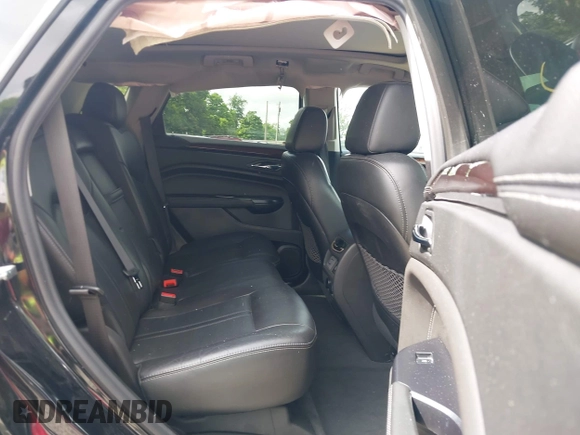 2015 Cadillac SRX Premium Collection z VIN 3GYFNGE36FS626641, wystawiony jako IAAI lot #42532380 z przebiegiem 178 799 mil mil oraz . Historia ofert i sprzedaży dostępna na DreamBid. Obrazek 8.