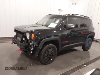 2018 Jeep Renegade Trailhawk z VIN ZACCJBCB7JPH91187, wystawiony jako IAAI lot #41984322 z przebiegiem 72 881 mil mil oraz . Historia ofert i sprzedaży dostępna na DreamBid. Obrazek 2.