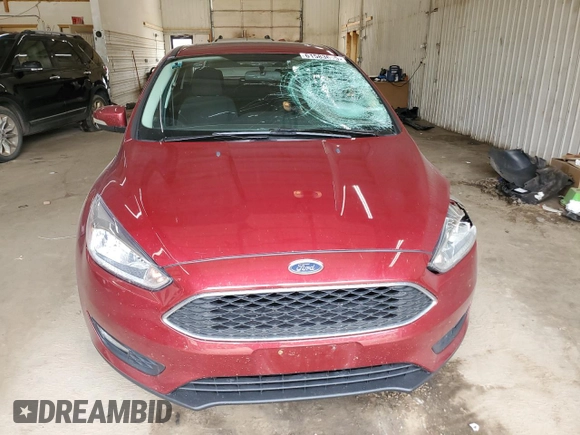 2016 Ford Focus SE with VIN 1FADP3F26GL253961, listed as a Copart auction lot 61583695 with 191,540 mi miles and Salvage title. Bid and sale history available at DreamBid. Image 5.