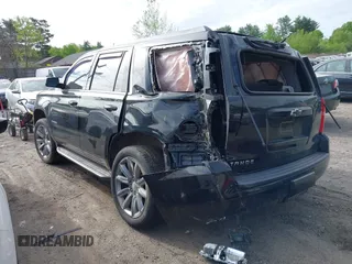 2016 Chevrolet Tahoe LT z VIN 1GNSKBKC7GR331631, wystawiony jako IAAI lot #42300624 z przebiegiem 73 126 mil mil oraz . Historia ofert i sprzedaży dostępna na DreamBid. Obrazek 13.