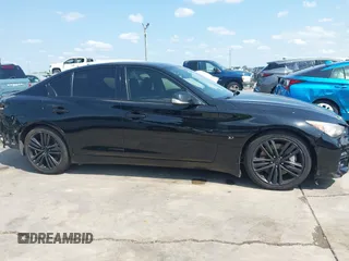 2014 Infiniti Q50 Sport with VIN JN1BV7AP0EM678832, listed as a IAAI auction lot 42370598 with 126,871 mi miles and . Bid and sale history available at DreamBid. Image 14.