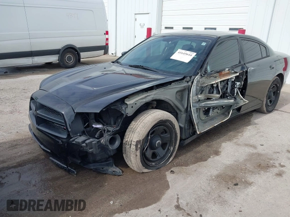 2013 Dodge Charger Police z VIN 2C3CDXAG5DH716369, wystawiony jako IAAI lot #41645644 z przebiegiem 127 535 mil mil oraz . Historia ofert i sprzedaży dostępna na DreamBid. Obrazek 2.