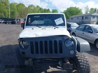 2014 Jeep Wrangler Unlimited Rubicon X with VIN 1C4BJWFG6EL240849, listed as a IAAI auction lot 42216082 with 118,912 mi miles and . Bid and sale history available at DreamBid. Image 12.