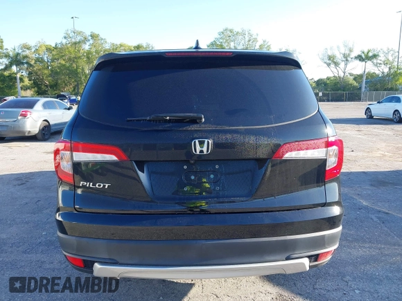 2021 Honda Pilot EX-L with VIN 5FNYF5H55MB044677, listed as a IAAI auction lot 42038704 with 38,684 mi miles and . Bid and sale history available at carsss.com. Image 17.