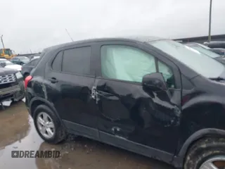 2019 Chevrolet Trax LS with VIN 3GNCJNSB7KL357677, listed as a IAAI auction lot 41897552 with 96,323 mi miles and . Bid and sale history available at DreamBid. Image 13.