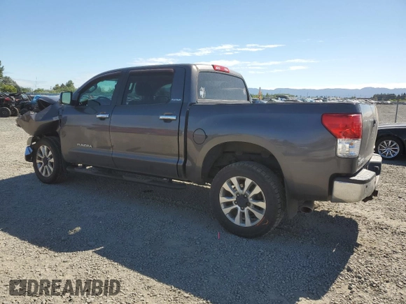 2012 Toyota Tundra 4WD Truck LTD with VIN 5TFHY5F15CX256557, listed as a Copart auction lot 58452704 with 128,640 mi miles and Salvage Title. Bid and sale history available at carsss.com. Image 2.