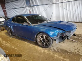 2000 Ford Mustang GT with VIN 1FAFP42X5YF115568, listed as a Copart auction lot 84767994 with 185,351 mi miles and Salvage Title. Bid and sale history available at carsss.com. Image 4.