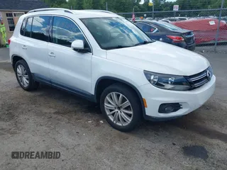 2012 Volkswagen Tiguan S with VIN WVGAV7AX0CW566151, listed as a IAAI auction lot 42826985 with 121,185 mi miles and . Bid and sale history available at DreamBid. Image 1.