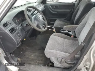 1999 Honda CR-V LX z VIN JHLRD1847XC040936, wystawiony jako Copart lot #56286075 z przebiegiem 296 489 mil mil oraz Szkoda całkowita • Salvage title. Historia ofert i sprzedaży dostępna na DreamBid. Obrazek 7.