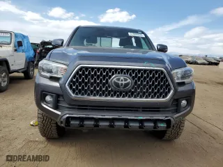 2019 Toyota Tacoma 4WD SR with VIN 5TFCZ5AN1KX206478, listed as a Copart auction lot 51000035 with 113,497 mi miles and Salvage Title. Bid and sale history available at carsss.com. Image 5.