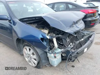 2004 Toyota Camry LE with VIN 4T1BF30K44U069441, listed as a IAAI auction lot 41740124 with 145,906 mi miles. Bid and sale history available at carsss.com. Image 12.