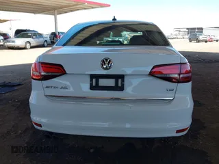2017 Volkswagen Jetta SEL z VIN 3VWL17AJ3HM406760, wystawiony jako IAAI lot #42002426 z przebiegiem 152 890 mil mil oraz . Historia ofert i sprzedaży dostępna na DreamBid. Obrazek 16.