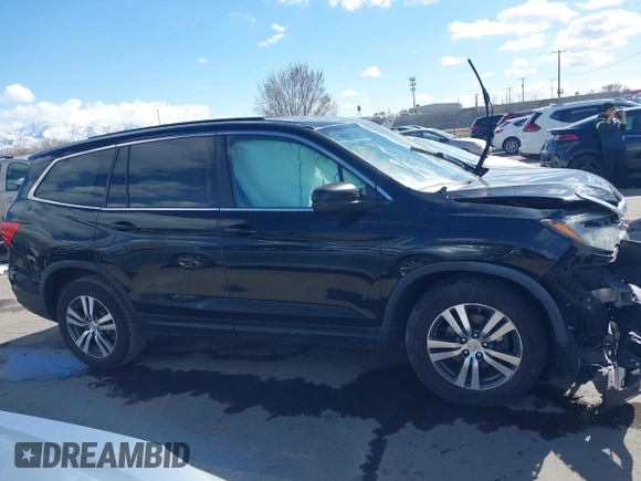 2016 Honda Pilot EX-L with VIN 5FNYF6H53GB048317, listed as a IAAI auction lot 41826297 with 127,672 mi miles. Bid and sale history available at carsss.com. Image 13.