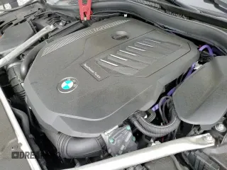 2023 BMW 5 Series 540i xDrive with VIN WBA73BJ05PWY12074, listed as a Copart auction lot 57856525 with 33,616 mi miles and Salvage title. Bid and sale history available at DreamBid. Image 15.