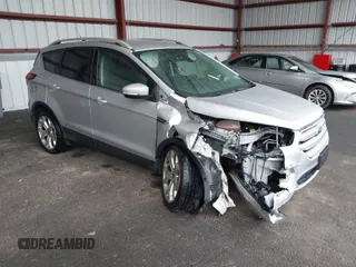 2019 Ford Escape Titanium with VIN 1FMCU9J9XKUA37695, listed as a IAAI auction lot 41868388 with 50,095 mi miles. Bid and sale history available at carsss.com. Image 1.