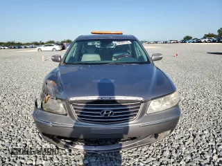 2007 Hyundai Azera SE z VIN KMHFC46F87A164195, wystawiony jako Copart lot #52500115 z przebiegiem 191 835 mil mil oraz Szkoda całkowita • Salvage title. Historia ofert i sprzedaży dostępna na DreamBid. Obrazek 5.