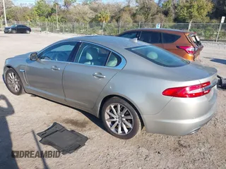 2013 Jaguar XF I4 RWD with VIN SAJWA0ES3DPU01767, listed as a IAAI auction lot 41704883 with 54,797 mi miles. Bid and sale history available at carsss.com. Image 3.