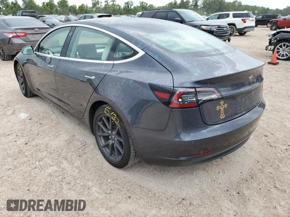 2018 Tesla Model 3 Long Range Battery z VIN 5YJ3E1EB2JF169809, wystawiony jako Copart lot #60623104 z przebiegiem 81 747 mil mil oraz Tytuł czysty. Historia ofert i sprzedaży dostępna na DreamBid. Obrazek 2.