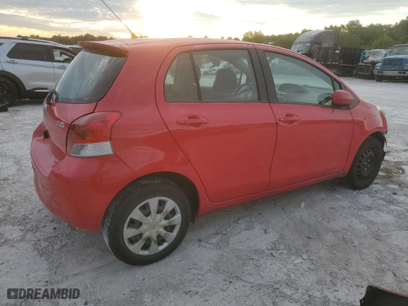2009 Toyota Yaris with VIN JTDKT903995232885, listed as a Copart auction lot 71397904 with 112,804 mi miles and Salvage Title. Bid and sale history available at carsss.com. Image 3.