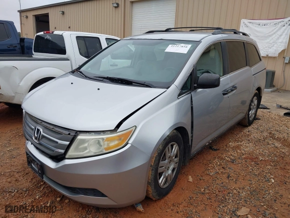 2011 Honda Odyssey LX with VIN 5FNRL5H20BB010579, listed as a IAAI auction lot 41217858 with 209,353 mi miles. Bid and sale history available at carsss.com. Image 2.