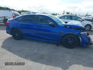 2022 Honda Civic Sport z VIN 2HGFE2F52NH603661, wystawiony jako IAAI lot #41070316 z przebiegiem 34 866 mil mil oraz . Historia ofert i sprzedaży dostępna na DreamBid. Obrazek 1.
