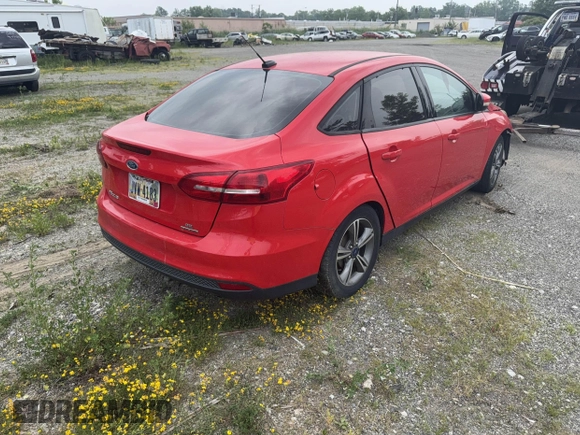 2016 Ford Focus SE with VIN 1FADP3F24GL403372, listed as a IAAI auction lot 42447728 with Not provided miles and . Bid and sale history available at DreamBid. Image 4.
