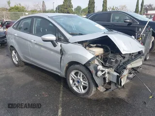 2017 Ford Fiesta SE with VIN 3FADP4BJXHM116900, listed as a IAAI auction lot 41815656 with 74,662 mi miles and . Bid and sale history available at DreamBid. Image 1.