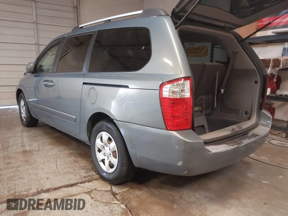 2009 Kia Sedona LX with VIN KNDMB233X96276905, listed as a IAAI auction lot 41394768 with 231,156 mi miles. Bid and sale history available at carsss.com. Image 3.