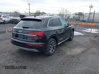 2021 Audi Q5 Premium Plus with VIN WA1BAAFYXM2117064, listed as a IAAI auction lot 42025878 with 75,766 mi miles and . Bid and sale history available at DreamBid. Image 4.