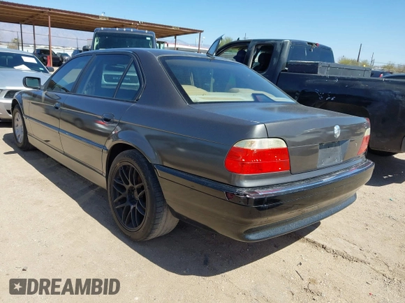 2001 BMW 7 Series 740iL with VIN WBAGH83421DP25417, listed as a IAAI auction lot 41725971 with 165,599 mi miles. Bid and sale history available at carsss.com. Image 6.