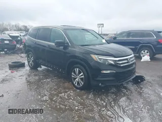 2016 Honda Pilot EX-L with VIN 5FNYF5H56GB031831, listed as a IAAI auction lot 41111342 with 244,197 mi miles and . Bid and sale history available at carsss.com. Image 1.