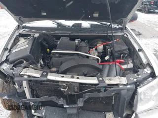 2005 GMC Envoy SLT with VIN 1GKDT13S352258640, listed as a IAAI auction lot 41226997 with 159,665 mi miles. Bid and sale history available at carsss.com. Image 10.