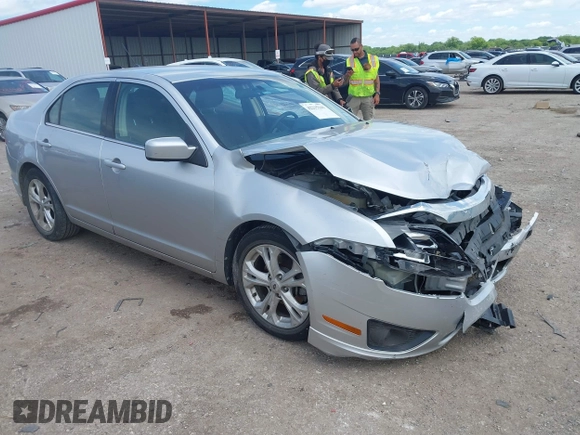 2012 Ford Fusion SE z VIN 3FAHP0HA8CR117122, wystawiony jako IAAI lot #42215141 z przebiegiem 158 703 mil mil oraz . Historia ofert i sprzedaży dostępna na DreamBid. Obrazek 1.