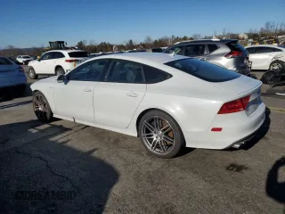 2014 Audi S7 Prestige with VIN WAUW2AFC0EN031008, listed as a Copart auction lot 84093234 with 60,066 mi miles and Salvage Title. Bid and sale history available at carsss.com. Image 2.