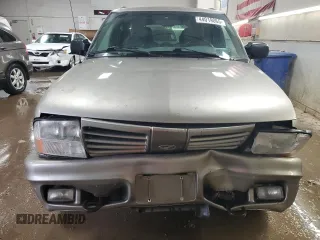 2001 Oldsmobile Bravada z VIN 1GHDT13W212196750, wystawiony jako Copart lot #44019065 z przebiegiem 126 878 mil mil oraz Szkody całkowita. Historia ofert i sprzedaży dostępna na DreamBid. Obrazek 5.