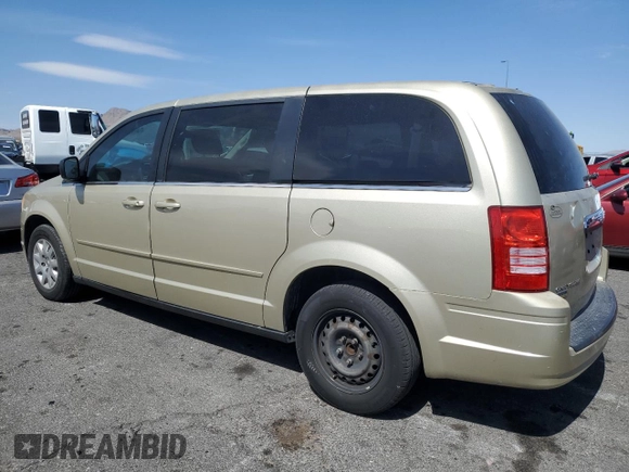 2010 Chrysler Town & Country LX with VIN 2A4RR4DE0AR188949, listed as a Copart auction lot 54140515 with 185,534 mi miles and Salvage Title. Bid and sale history available at DreamBid. Image 2.