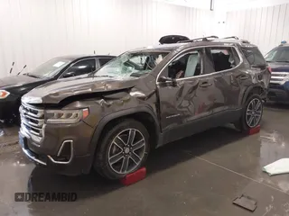 2020 GMC Acadia SLT with VIN 1GKKNULS8LZ154037, listed as a IAAI auction lot 42061743 with 54,657 mi miles and . Bid and sale history available at DreamBid. Image 2.