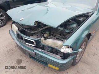1998 BMW 3 Series 318iA with VIN WBACC0320WEK26338, listed as a IAAI auction lot 41187823 with 145,250 mi miles. Bid and sale history available at carsss.com. Image 6.
