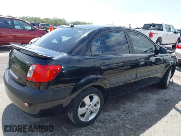 2008 Kia Rio LX with VIN KNADE123X86323641, listed as a IAAI auction lot 41985631 with 175,102 mi miles and . Bid and sale history available at DreamBid. Image 4.