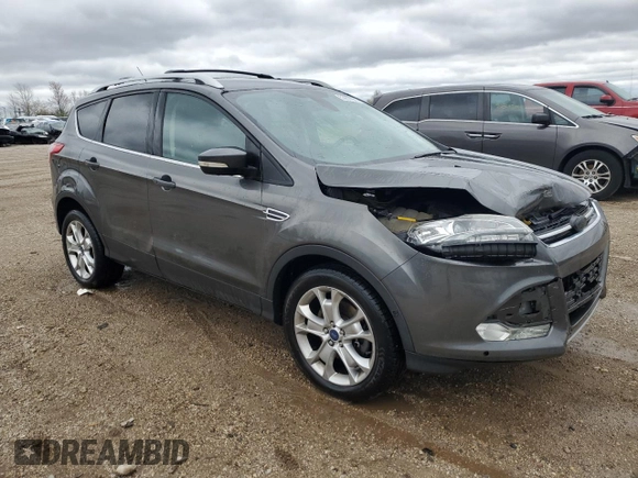 2016 Ford Escape Titanium with VIN 1FMCU9J94GUA43063, listed as a Copart auction lot 53875085 with 71,227 mi miles and Salvage Title. Bid and sale history available at DreamBid. Image 4.