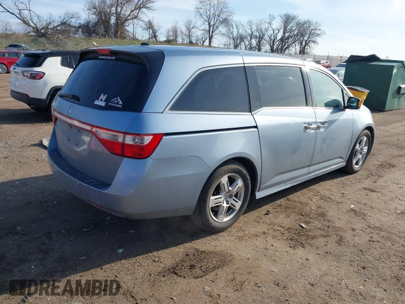 2011 Honda Odyssey Touring with VIN 5FNRL5H9XBB085626, listed as a IAAI auction lot 41890577 with 178,317 mi miles and . Bid and sale history available at DreamBid. Image 4.