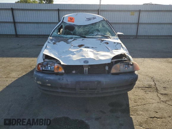 1999 Suzuki Swift z VIN 2S2AB21H7X6601864, wystawiony jako Copart lot #72661164 z przebiegiem 261 948 mil mil oraz Szkoda całkowita • Salvage title. Historia ofert i sprzedaży dostępna na DreamBid. Obrazek 5.