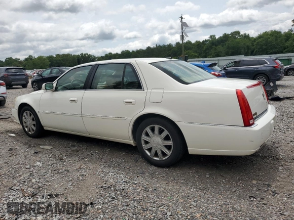 2006 Cadillac DTS 1SC z VIN 1G6KD57Y26U177384, wystawiony jako Copart lot #58200665 z przebiegiem 122 356 mil mil oraz Szkoda całkowita • Salvage title. Historia ofert i sprzedaży dostępna na DreamBid. Obrazek 2.