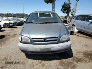 2000 Toyota Sienna LE with VIN 4T3ZF13C6YU296375, listed as a Copart auction lot 63846875 with 279,915 mi miles and Salvage title. Bid and sale history available at DreamBid. Image 5.