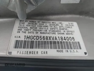 1997 Honda Accord Value with VIN 1HGCD568XVA184006, listed as a IAAI auction lot 41818518 with 276,230 mi miles and . Bid and sale history available at carsss.com. Image 9.