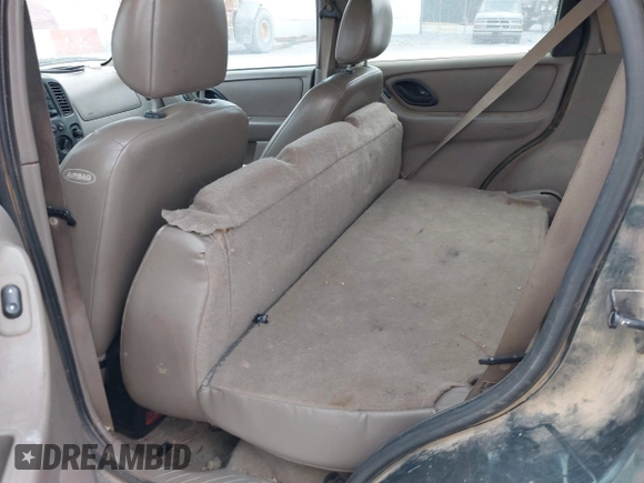 2002 Ford Escape with VIN 1FMCU02132KD51298, listed as a IAAI auction lot 41550132 with 218,830 mi miles and . Bid and sale history available at DreamBid. Image 8.