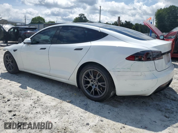 2021 Tesla Model S Long Range with VIN 5YJSA1E52MF443953, listed as a Copart auction lot 59838715 with 54,643 mi miles and Salvage title. Bid and sale history available at DreamBid. Image 2.